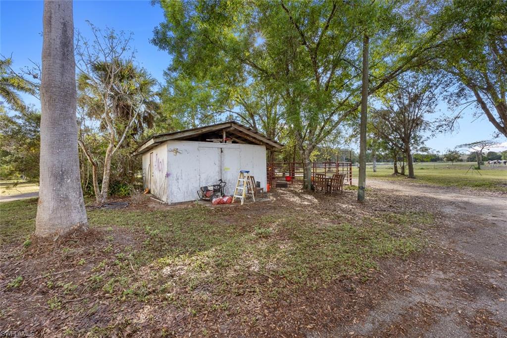 321 Brandy Lane Naples, FL 34114 - Photo 24 of 24 Storage shed well pump