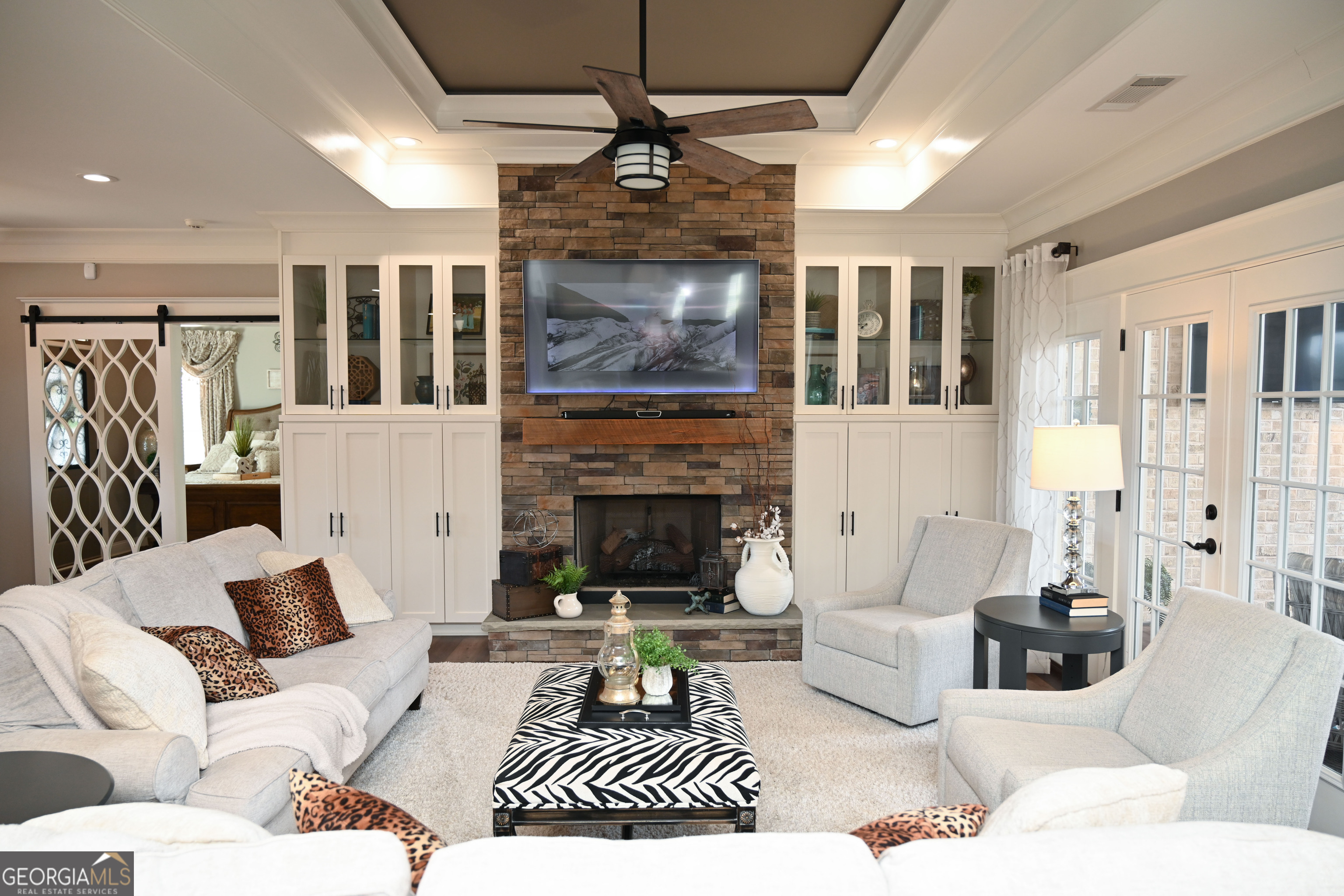 399 Overlook Trail Williamson, GA 30292 - Photo 11 of 52 a living room with furniture and a fireplace