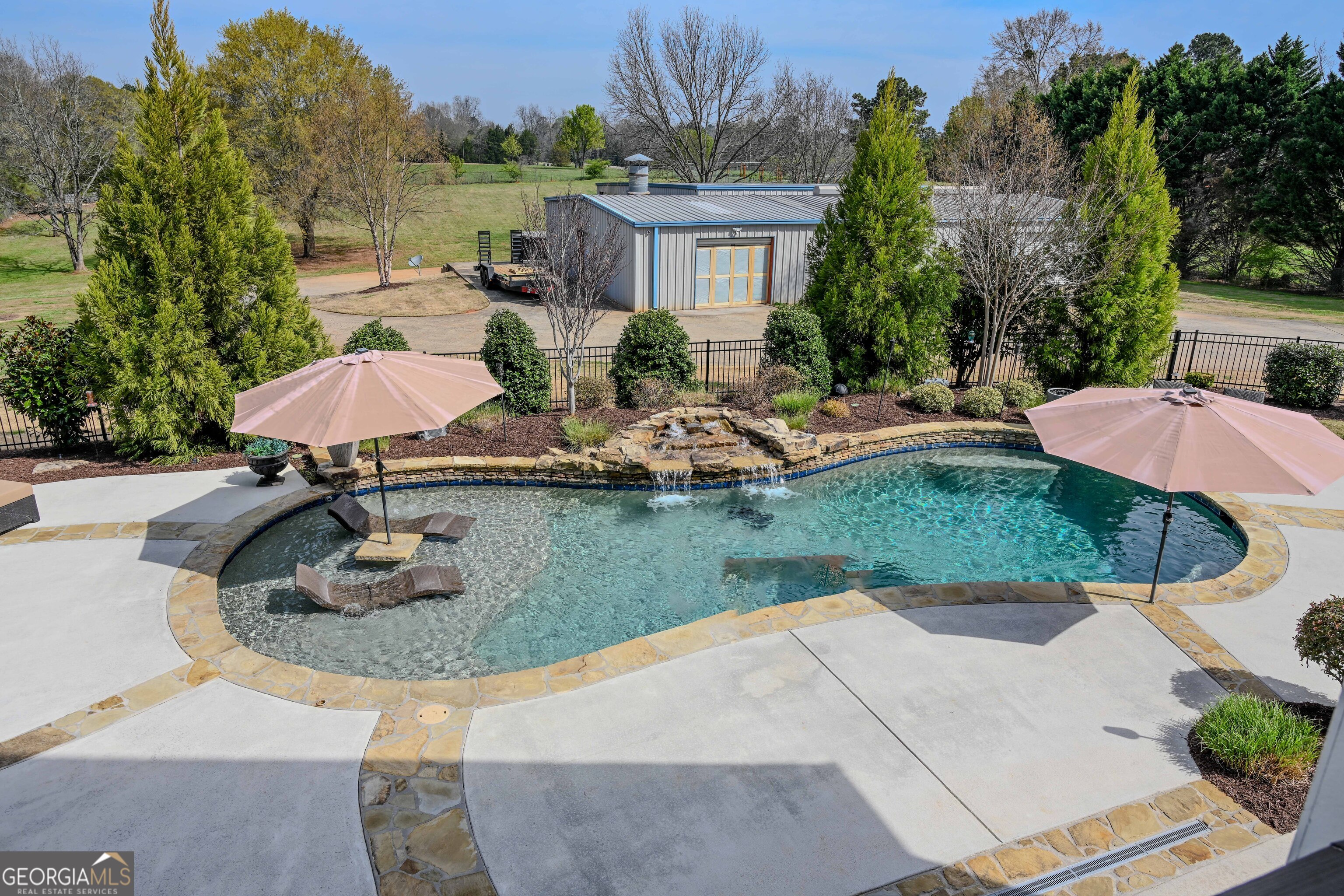 399 Overlook Trail Williamson, GA 30292 - Photo 20 of 52 a view of a house with yard and furniture