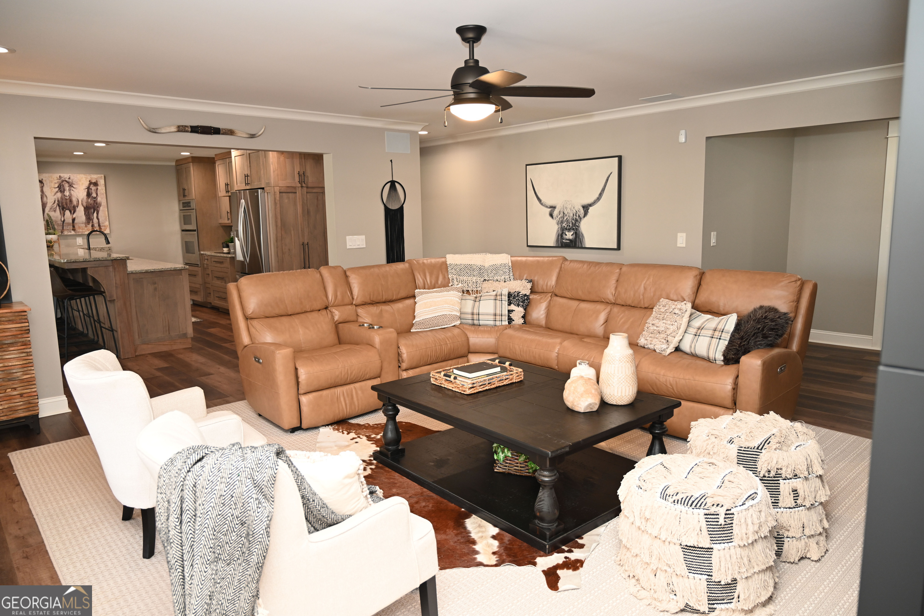 399 Overlook Trail Williamson, GA 30292 - Photo 35 of 52 a living room with furniture and wooden floor