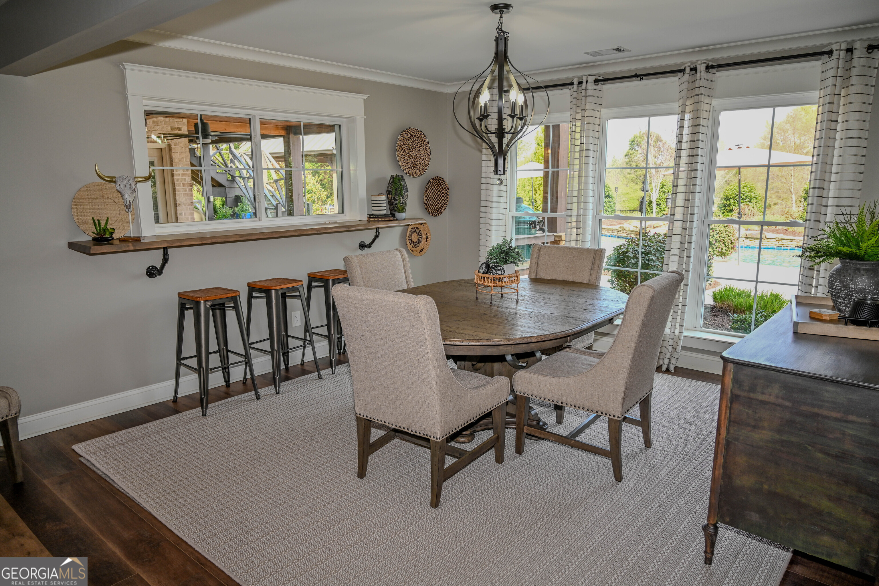 399 Overlook Trail Williamson, GA 30292 - Photo 38 of 52 a view of a dining room with furniture window and outside view