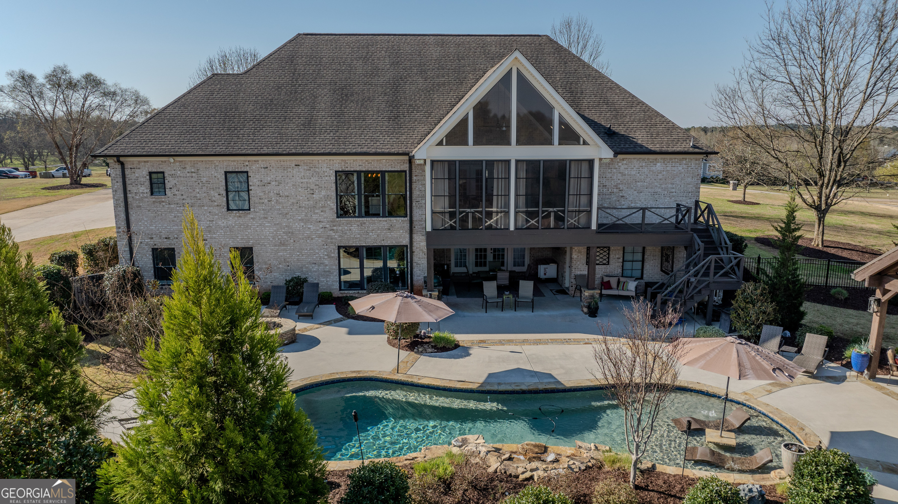 399 Overlook Trail Williamson, GA 30292 - Photo 4 of 52 a front view of a house with garden