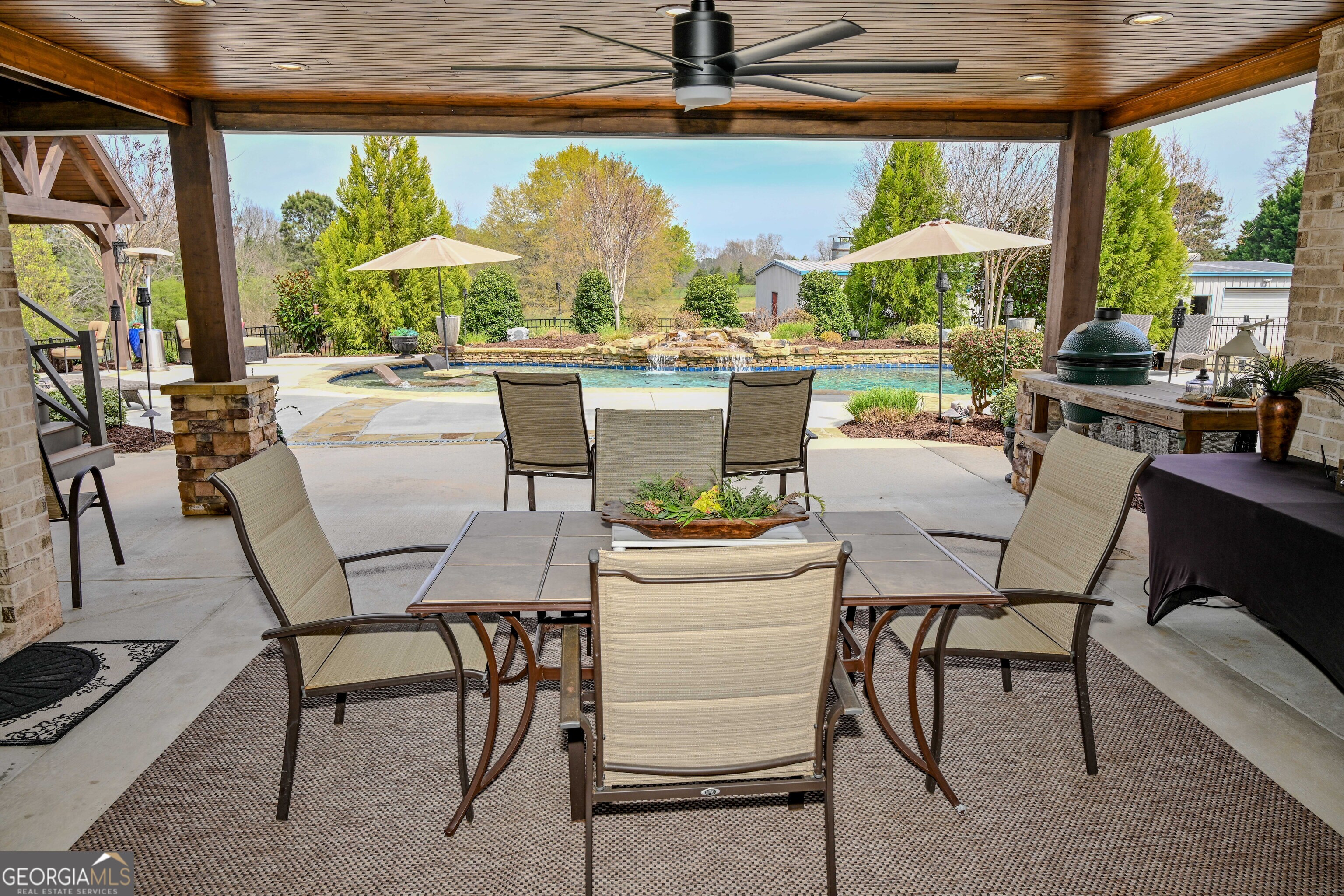 399 Overlook Trail Williamson, GA 30292 - Photo 48 of 52 a dining room with furniture and a large window