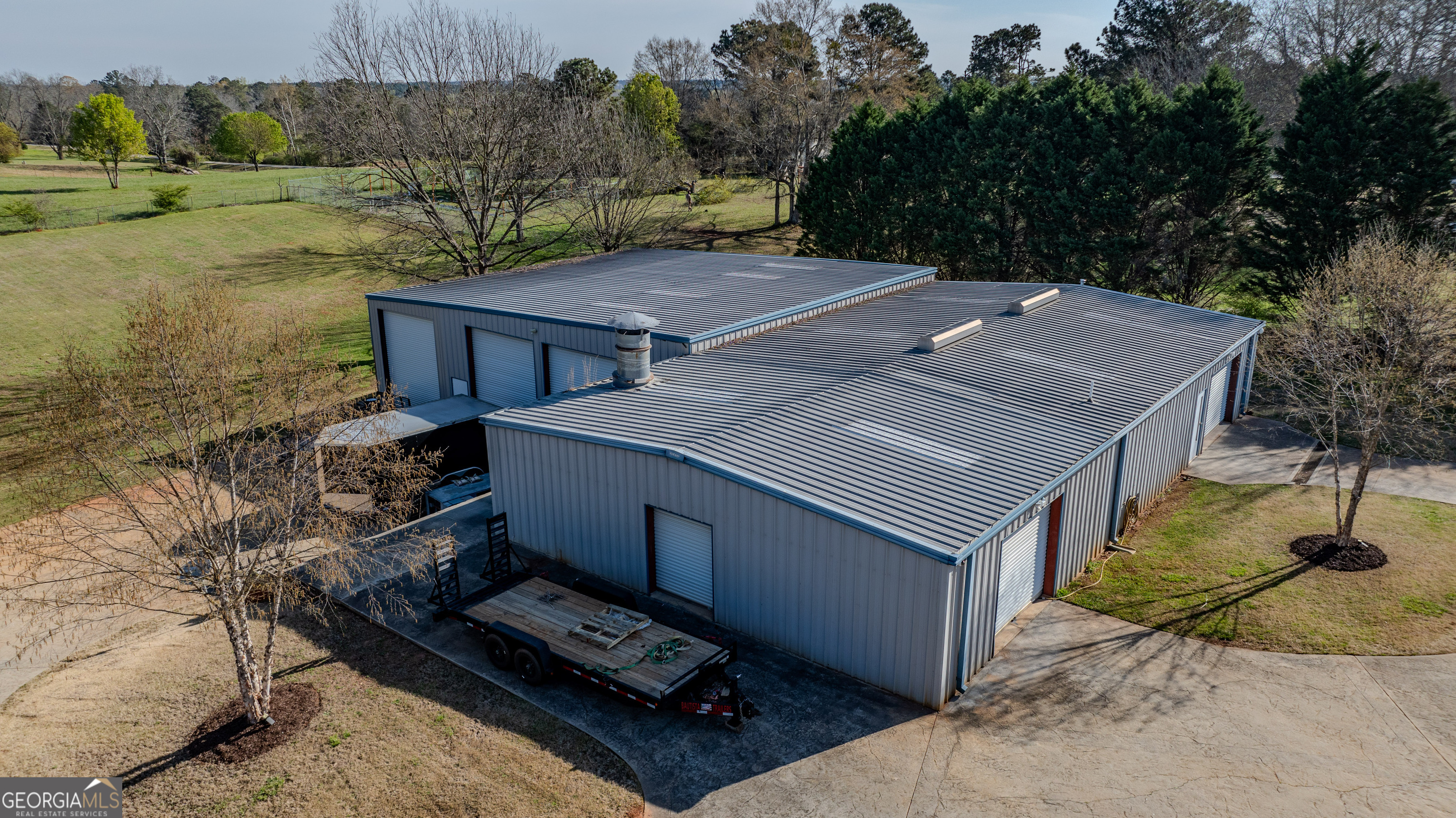 399 Overlook Trail Williamson, GA 30292 - Photo 51 of 52 a view of a houses with a yard
