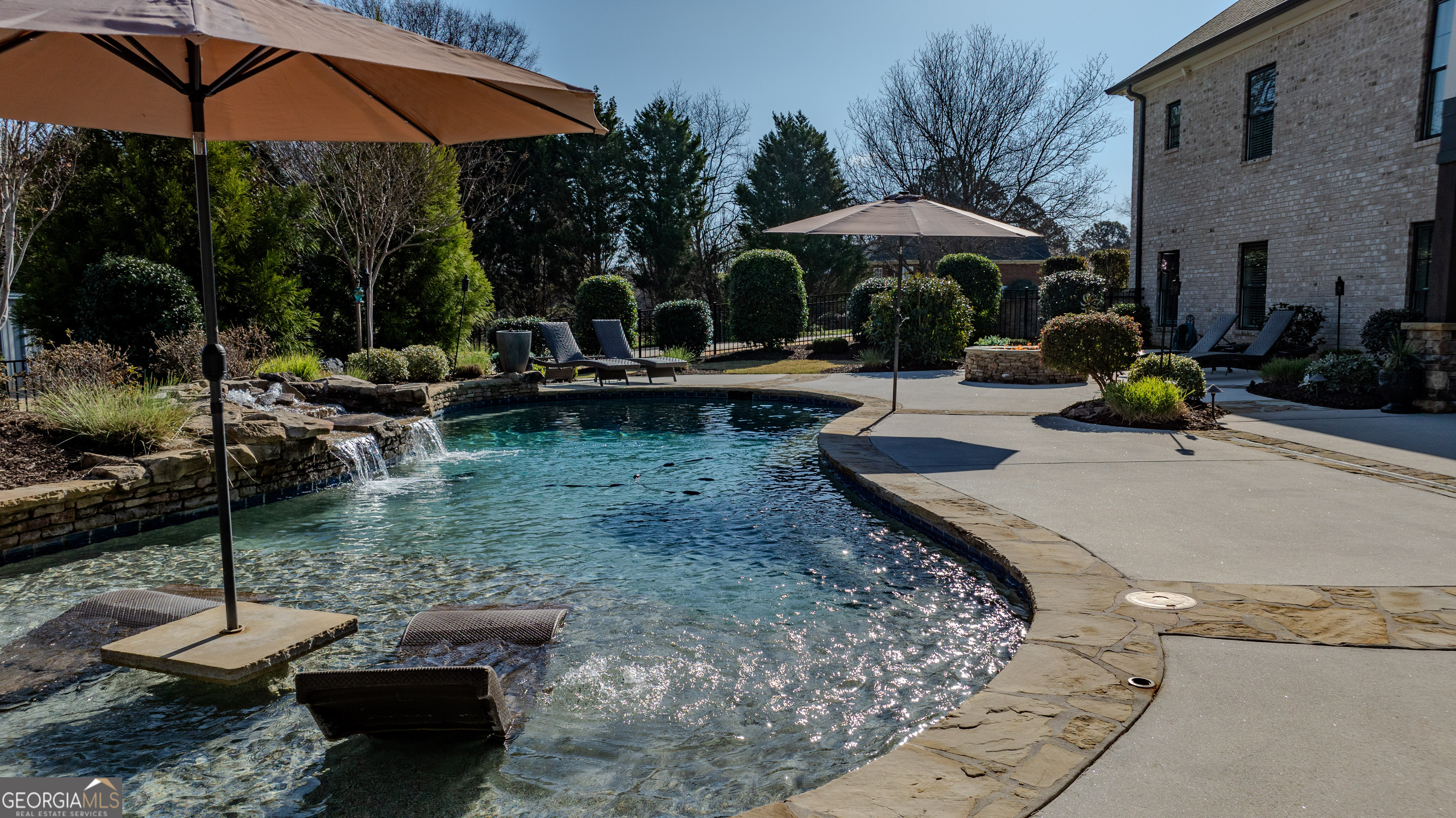 399 Overlook Trail Williamson, GA 30292 - Photo 9 of 52 a view of a backyard with sitting area