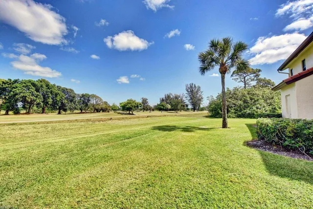 a view of a house with a big yard