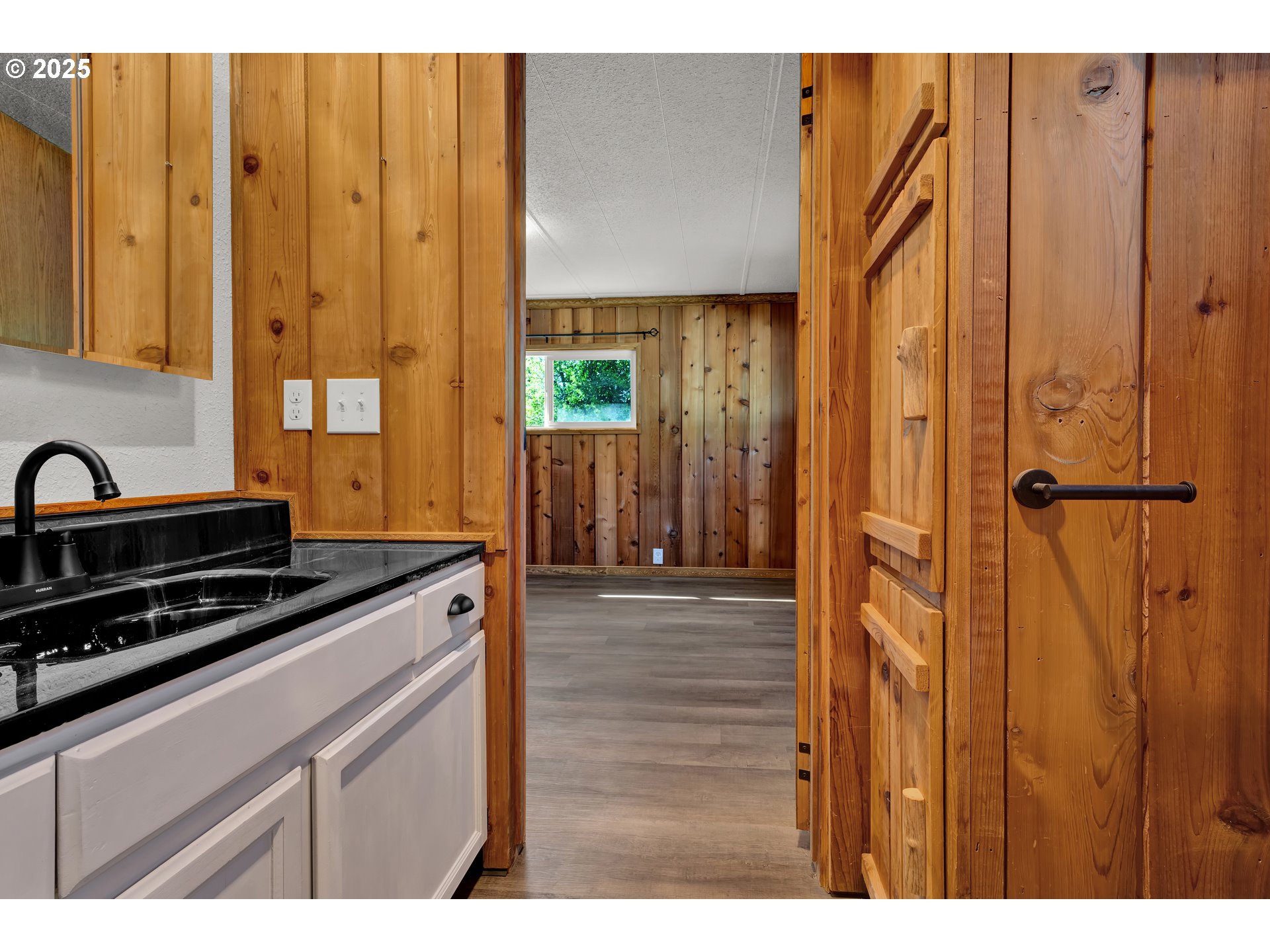 5055 Northeast Elliott Circle, Unit 8 Corvallis, OR 97330 - Photo 18 of 35 a kitchen view with a sink a counter top space and cabinets