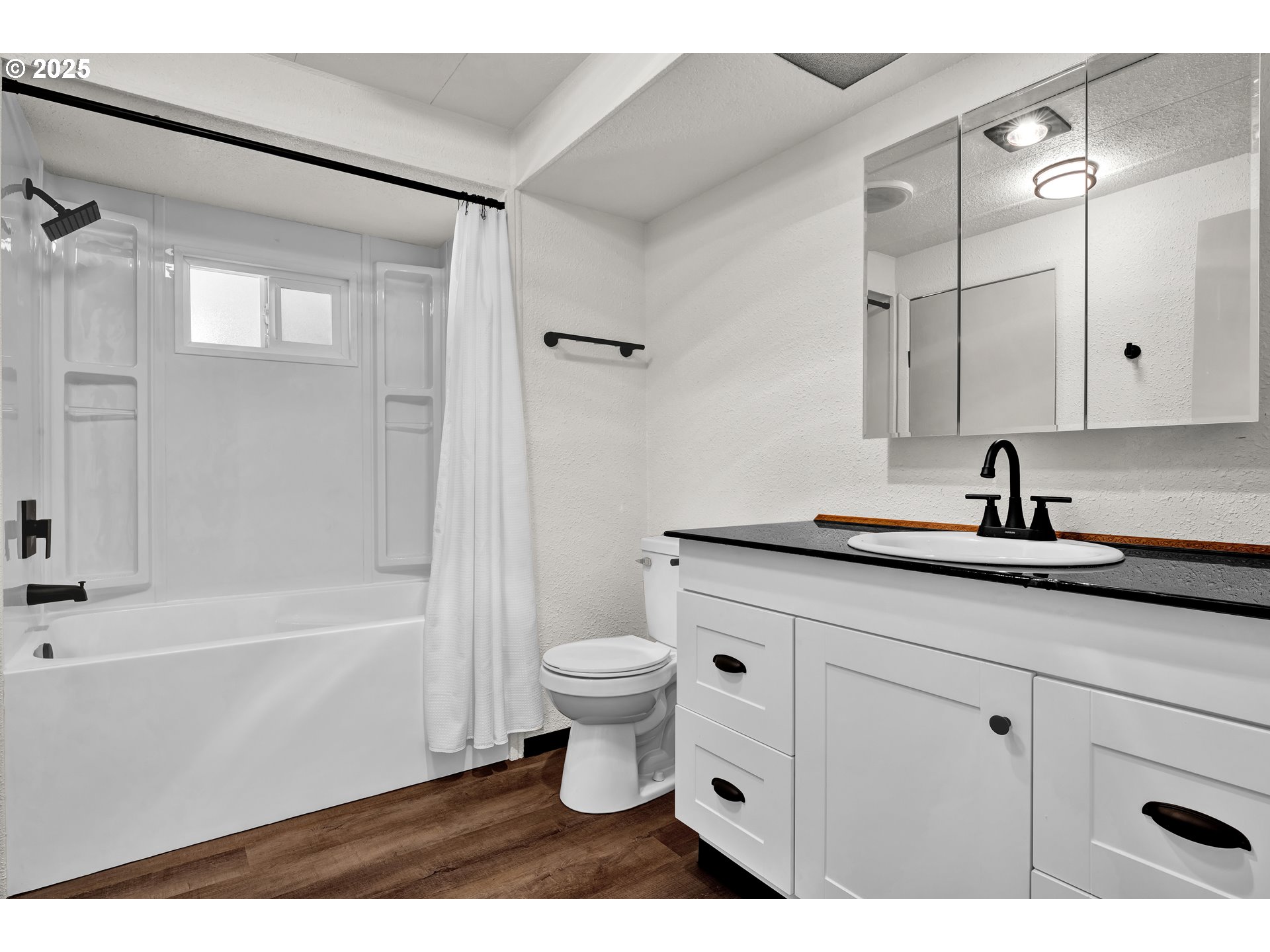 5055 Northeast Elliott Circle, Unit 8 Corvallis, OR 97330 - Photo 19 of 35 a bathroom with a sink a toilet and shower