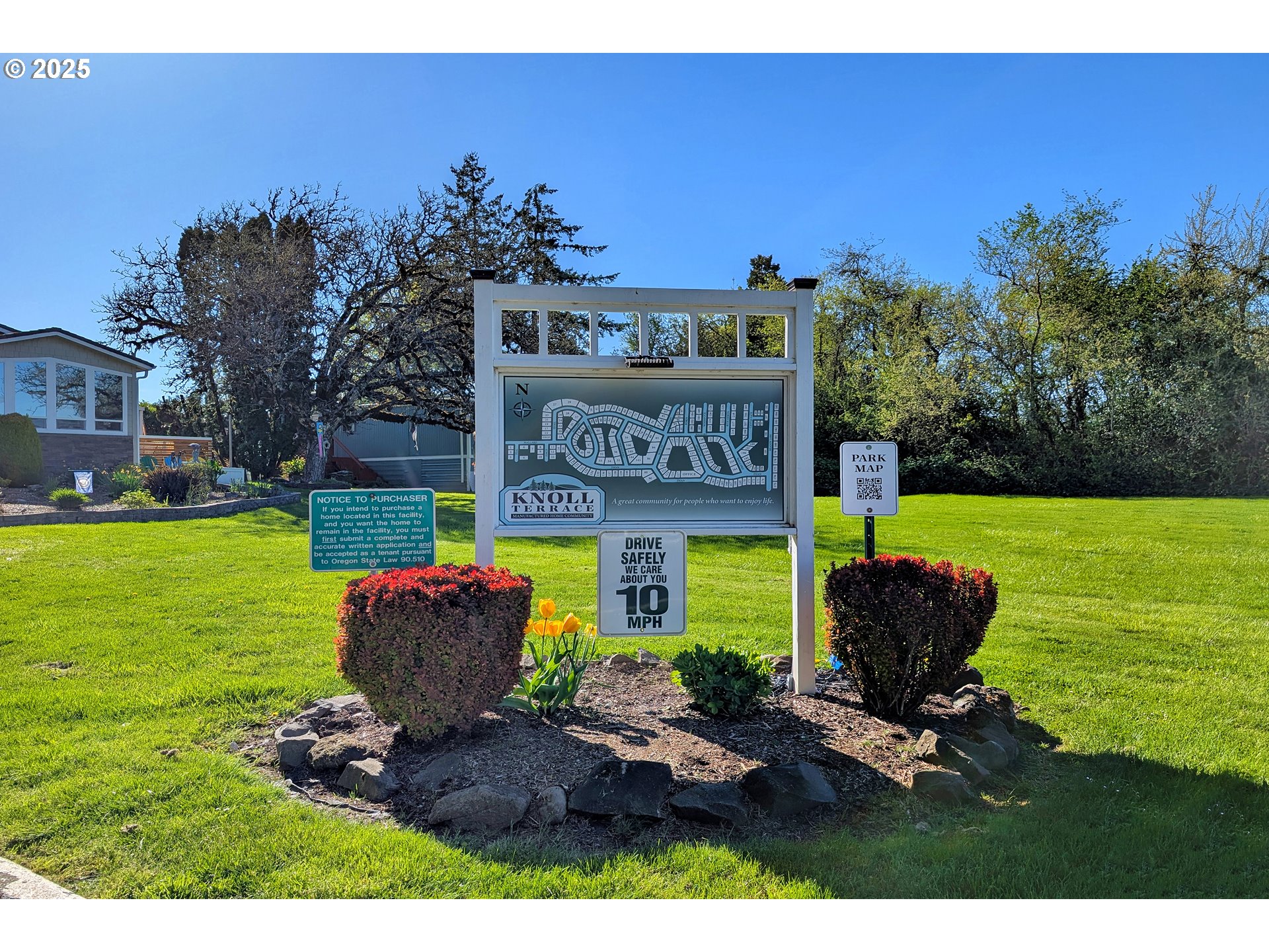 5055 Northeast Elliott Circle, Unit 8 Corvallis, OR 97330 - Photo 29 of 35 a wooden bench sitting in the middle of a park
