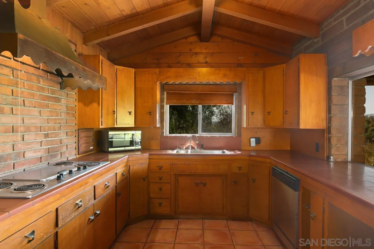 32630 Camino Moro Warner Springs, CA 92086 - Photo 16 of 33 a kitchen with sink a stove and cabinets