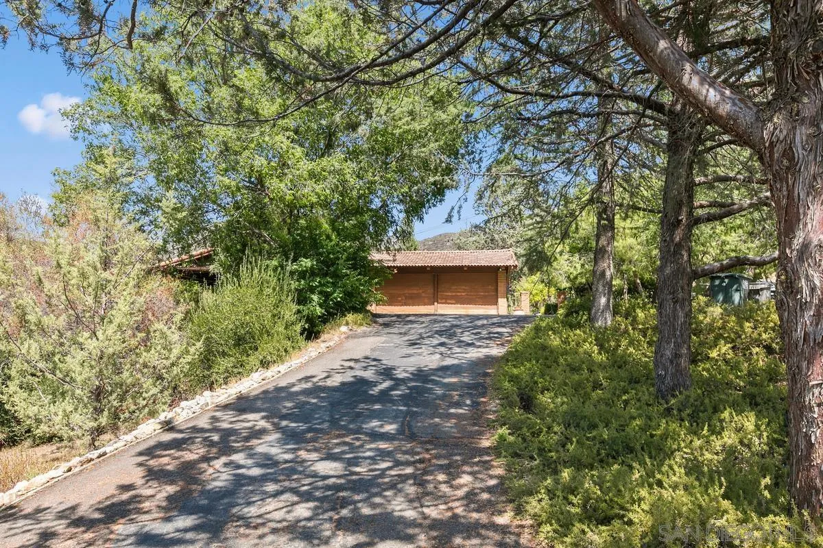 32630 Camino Moro Warner Springs, CA 92086 - Photo 2 of 33 a couple of potted plants in front of a building