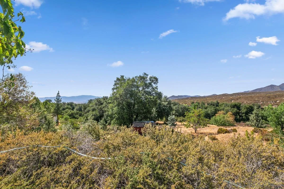 32630 Camino Moro Warner Springs, CA 92086 - Photo 26 of 33 a view of a lake with mountains in the background