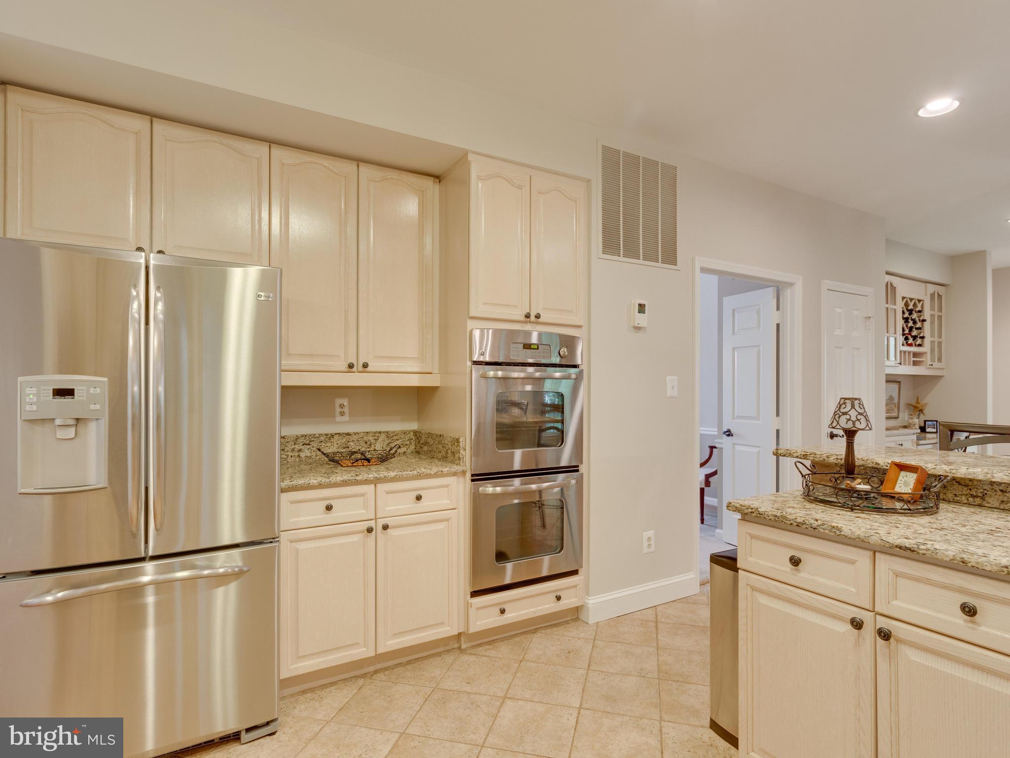 8119 Ridge Creek Way Springfield, VA 22153 - Photo 8 of 30 Updated Kitchen with Stainless Steel Appliances
