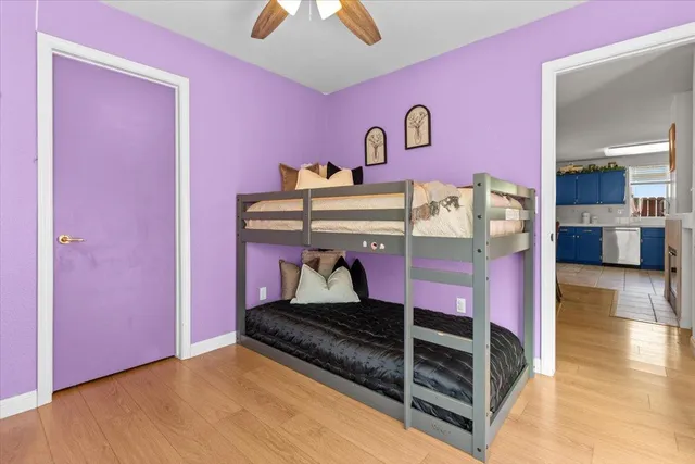 a view of a livingroom with furniture and a potted plant