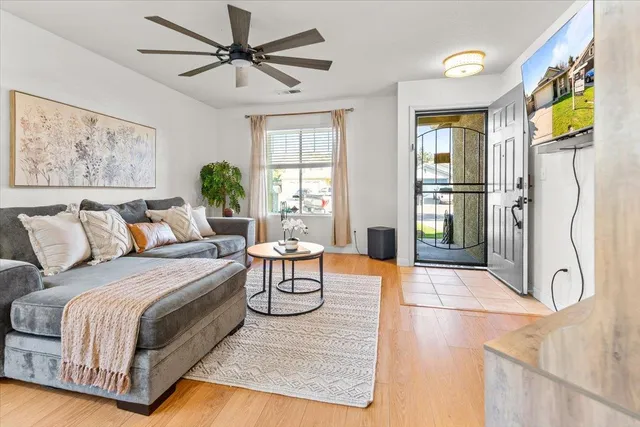 a spacious bedroom with a bed a window and walk in closet