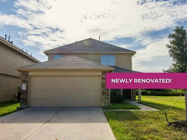 a sign on the side of the road