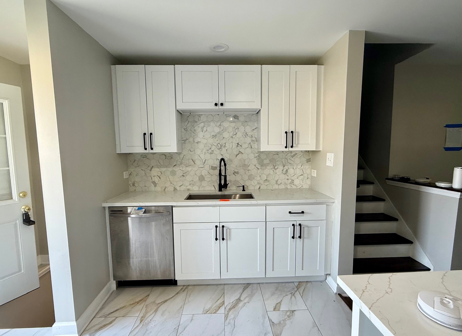 2958 191st Street Lansing, IL 60438 - Photo 4 of 25 a kitchen with a sink stove and cabinets