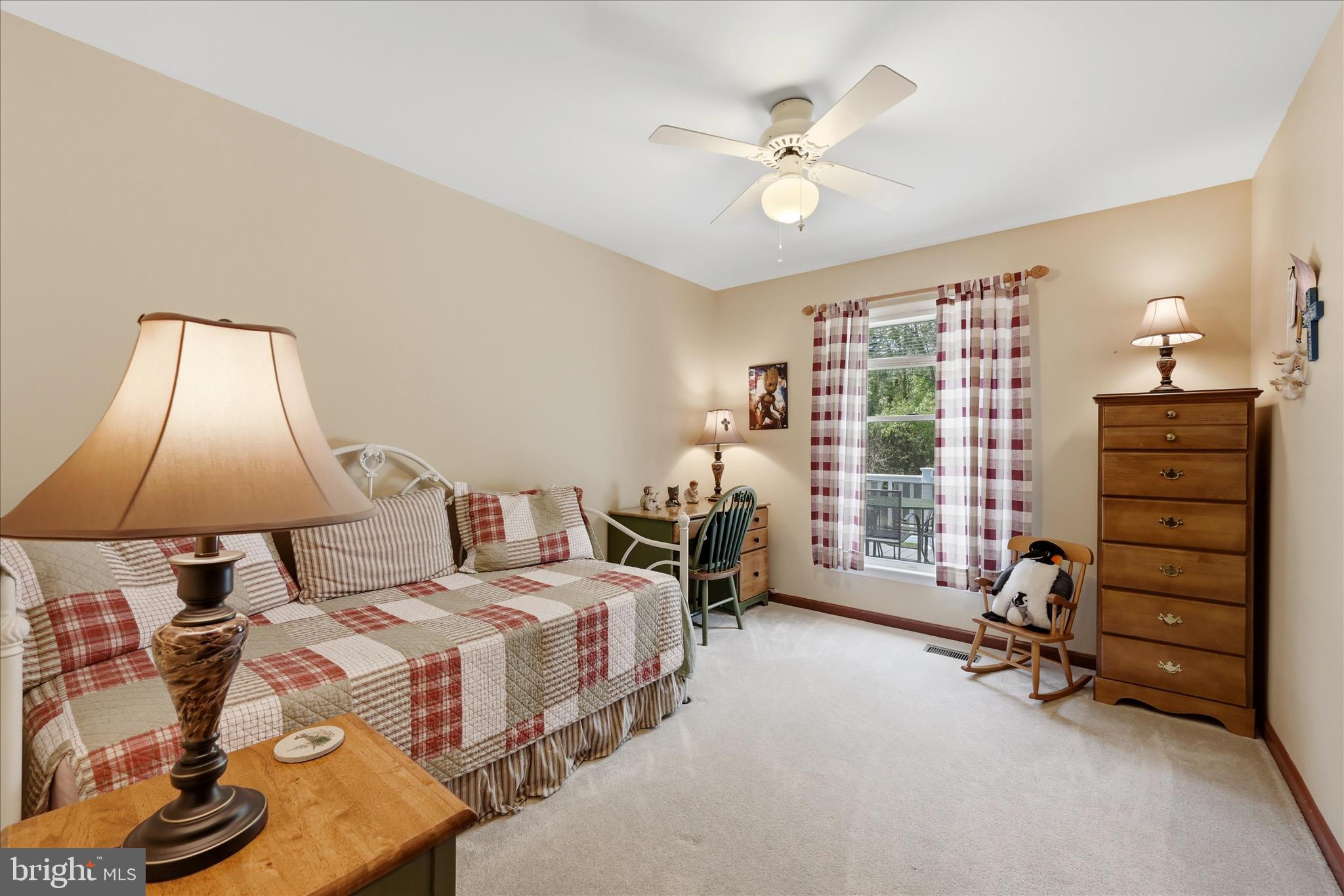 16335 Back Road Strasburg, VA 22657 - Photo 30 of 56 a bedroom with a bed and a chandelier