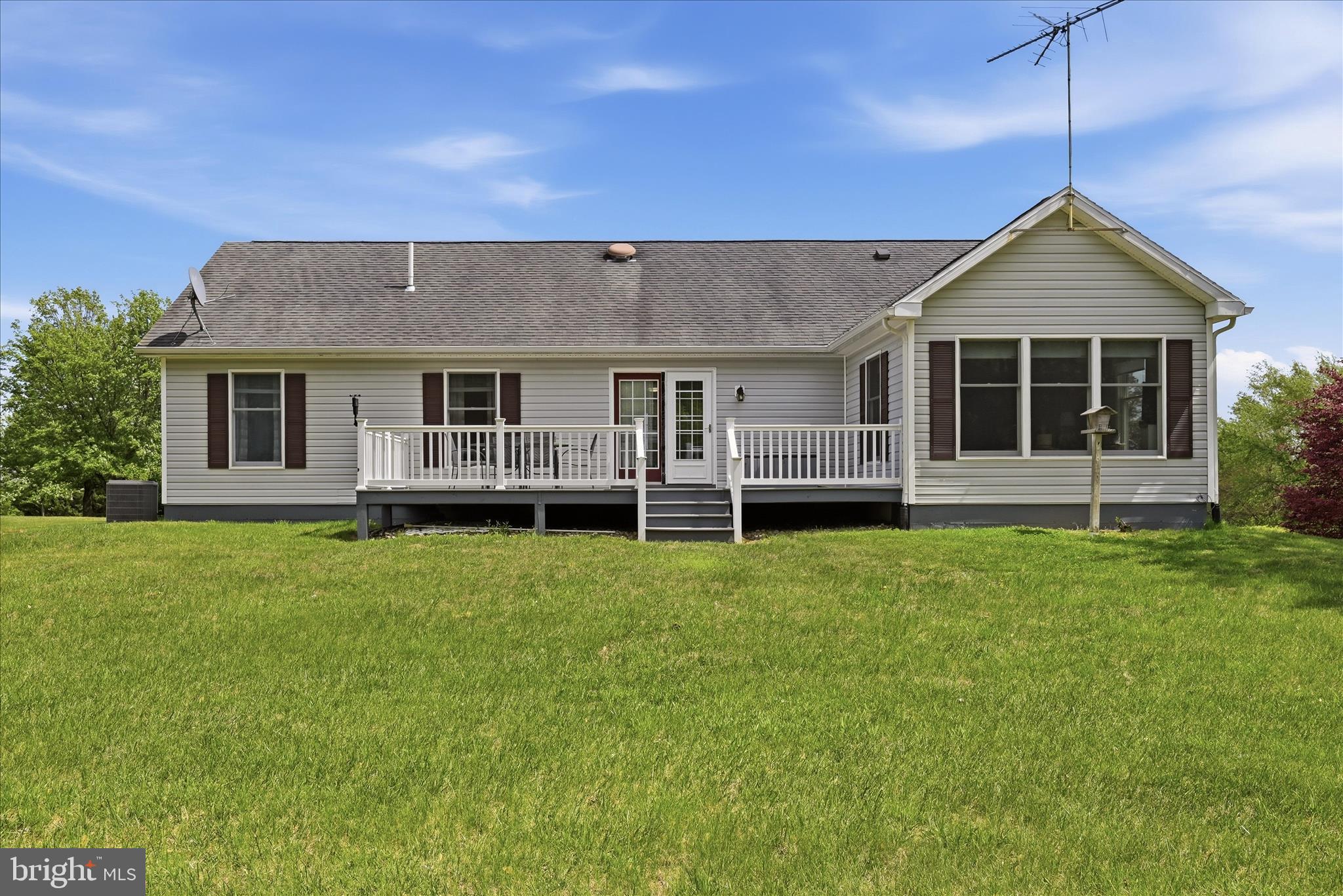 16335 Back Road Strasburg, VA 22657 - Photo 44 of 56 a front view of a house with a garden