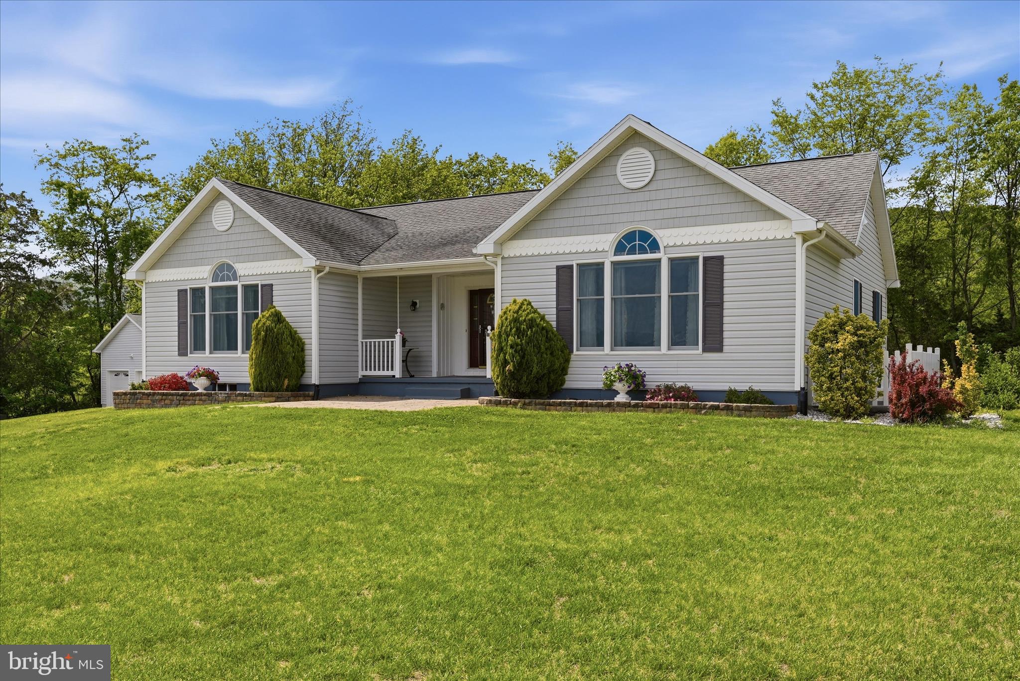 16335 Back Road Strasburg, VA 22657 - Photo 6 of 56 a front view of house with yard and green space