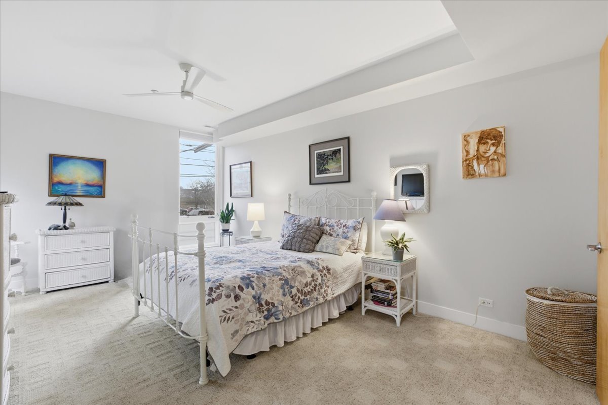 2515 Prairie Avenue, Unit 1E Evanston, IL 60201 - Photo 9 of 17 a bedroom with a bed and a couch