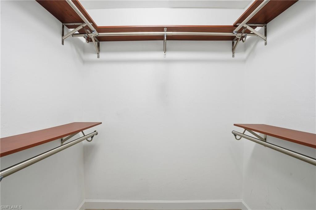 6735 Plantation Manor Loop Fort Myers, FL 33966 - Photo 19 of 46 a view of a room with rack on the wall