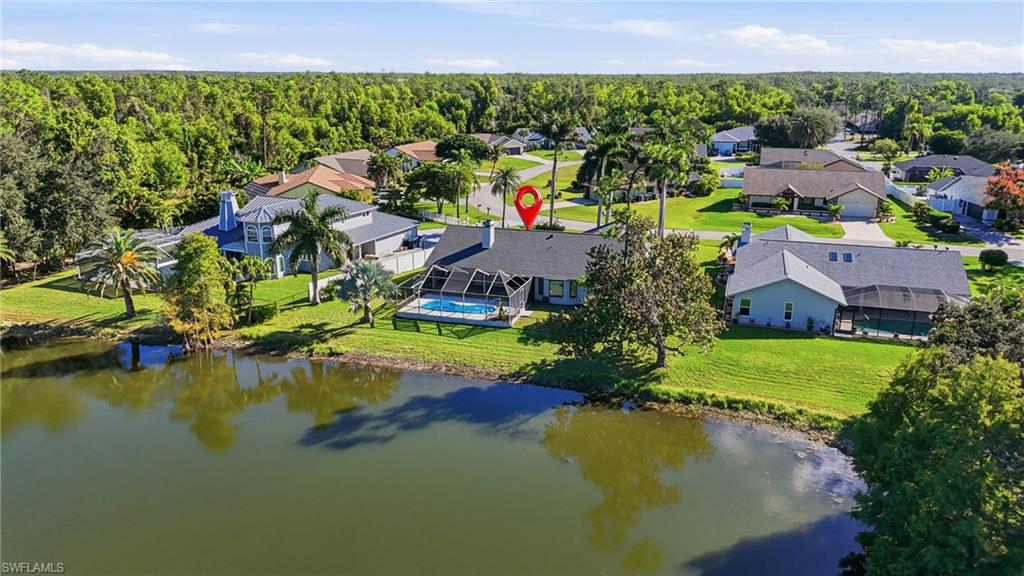 6735 Plantation Manor Loop Fort Myers, FL 33966 - Photo 40 of 46 an aerial view of residential houses with outdoor space and swimming pool