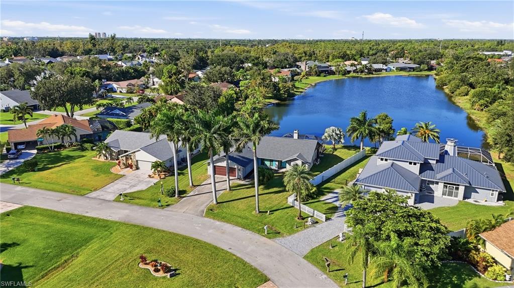 6735 Plantation Manor Loop Fort Myers, FL 33966 - Photo 41 of 46 an aerial view of residential houses with outdoor space and swimming pool
