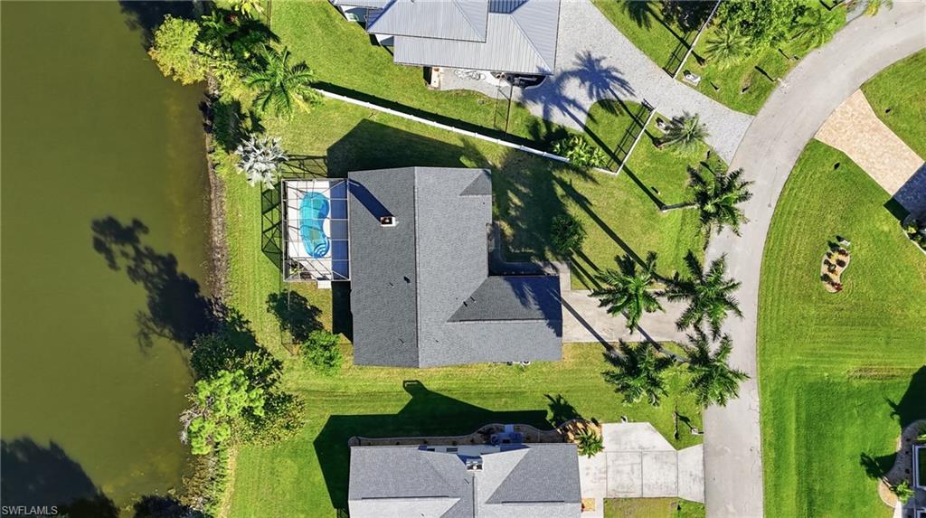 6735 Plantation Manor Loop Fort Myers, FL 33966 - Photo 5 of 46 an aerial view of a house with a yard