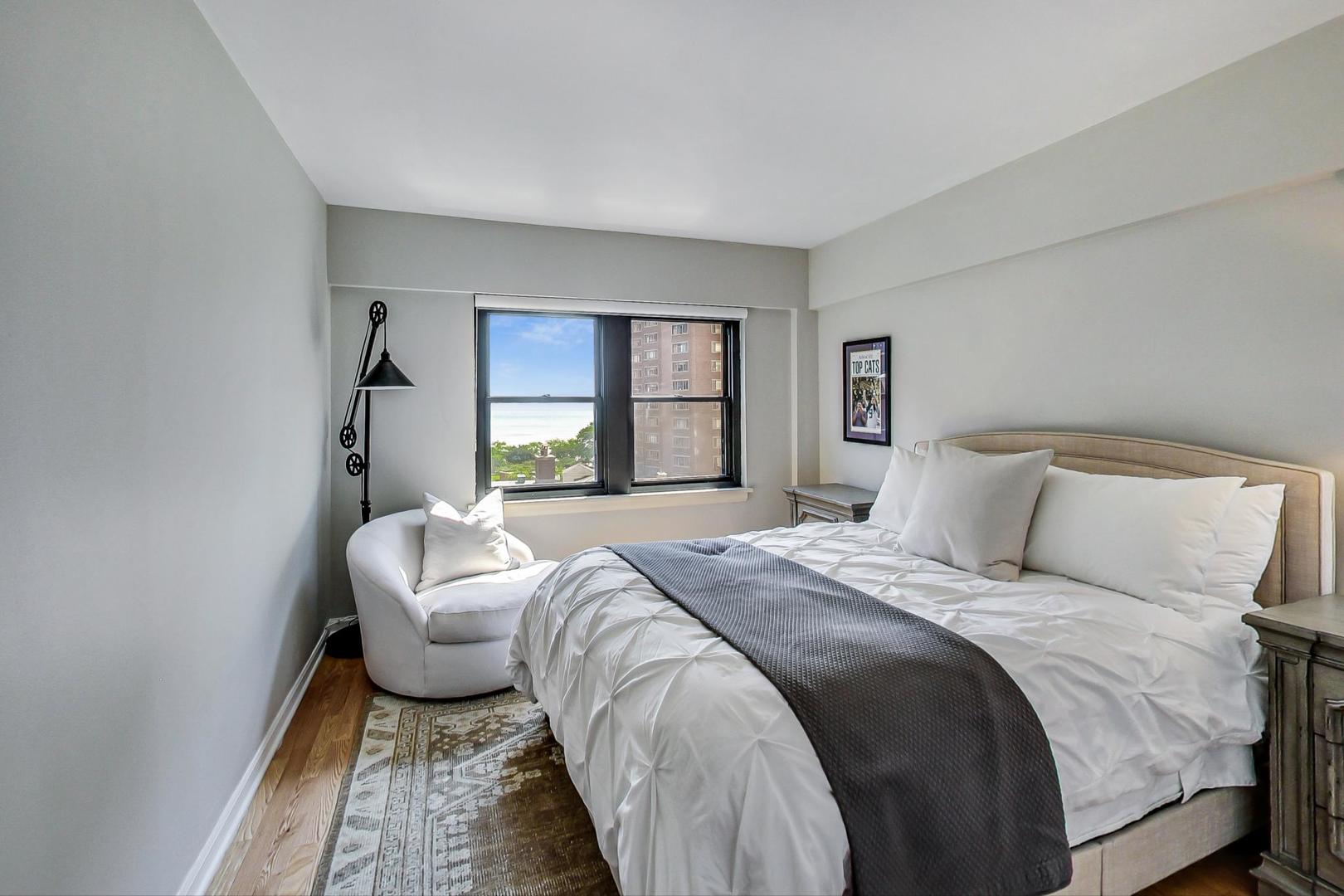 1350 North Astor Street, Unit 8B Chicago, IL 60610 - Photo 18 of 27 a bedroom with a bed and a window