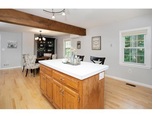 9 Grandview Road Arlington, MA 02476 - Photo 13 of 34 a living room with stainless steel appliances kitchen island furniture and a large window