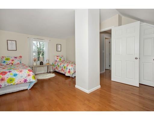9 Grandview Road Arlington, MA 02476 - Photo 29 of 34 a bedroom with furniture and a wooden floor