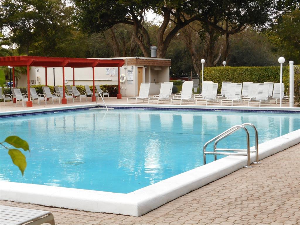 3300 West Rolling Hills Circle, Unit 610 Davie, FL 33328 - Photo 18 of 22 a view of swimming pool from a balcony