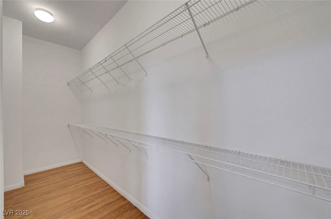 9417 Wisdom Valley Avenue Las Vegas, NV 89149 - Photo 38 of 67 Spacious closet featuring light wood-style flooring