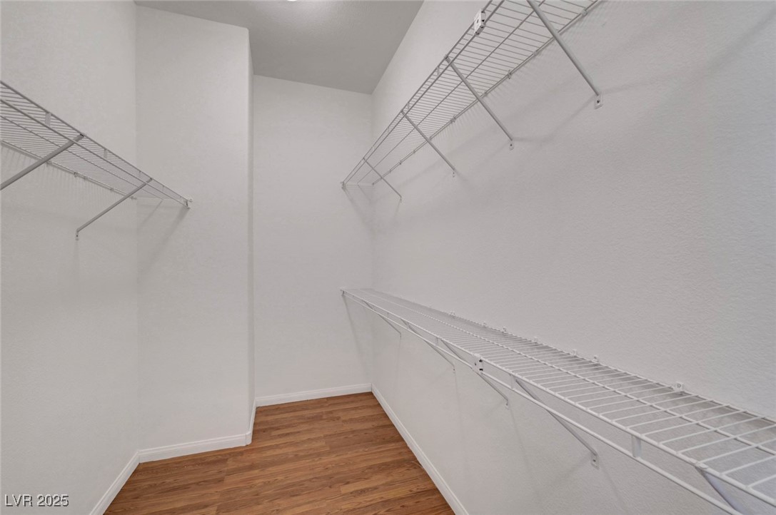 9417 Wisdom Valley Avenue Las Vegas, NV 89149 - Photo 39 of 67 Spacious closet with light wood-type flooring