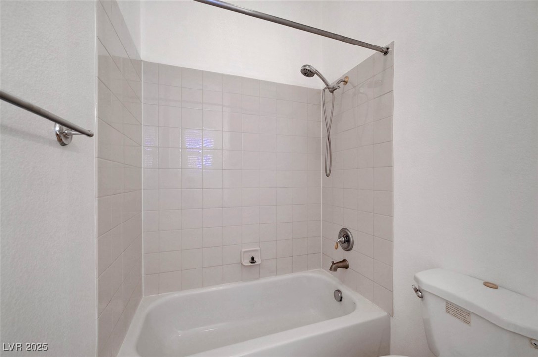 9417 Wisdom Valley Avenue Las Vegas, NV 89149 - Photo 45 of 67 Bathroom featuring tub / shower combination and toilet