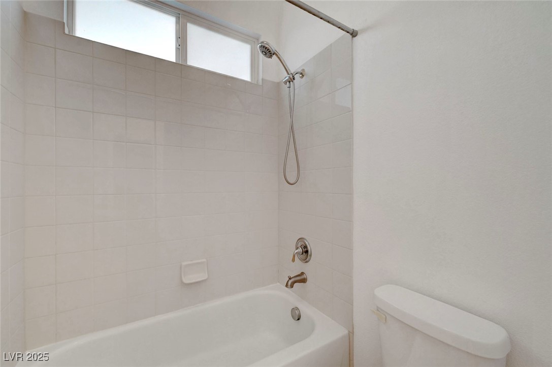9417 Wisdom Valley Avenue Las Vegas, NV 89149 - Photo 49 of 67 Full bathroom with toilet and shower / washtub combination