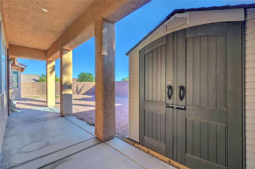 9417 Wisdom Valley Avenue Las Vegas, NV 89149 - Photo 61 of 67 Fenced backyard with a patio