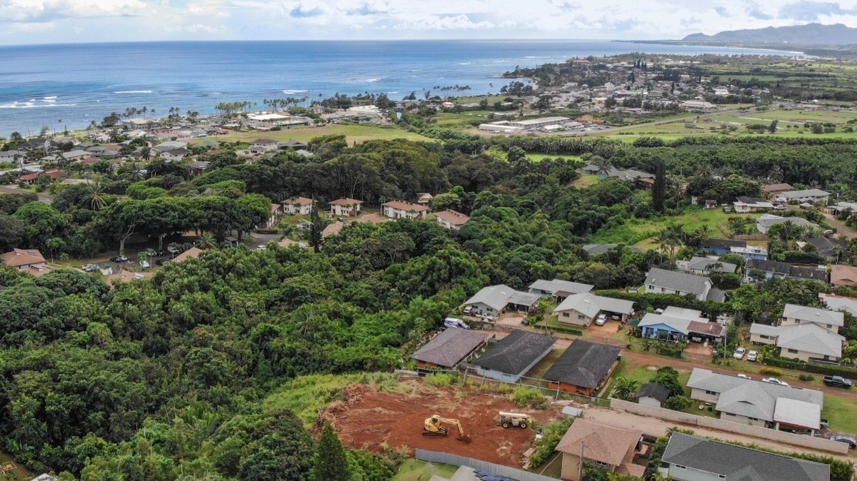 Pelehu Road, Unit 2 Kapaa, HI 96746 - Photo 2 of 3 an aerial view of a city with lots of residential buildings