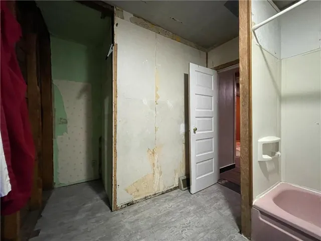 a view of room with bathroom