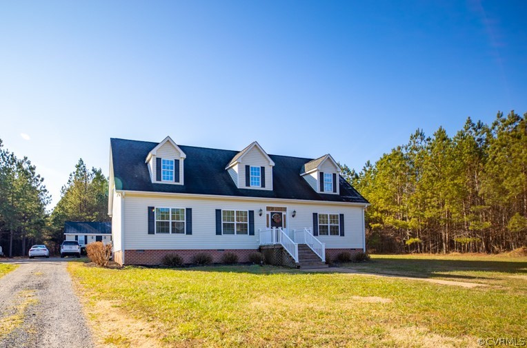 209 Chapel Road Kenbridge, VA 23944 - Photo 1 of 31 a view of a house with a swimming pool