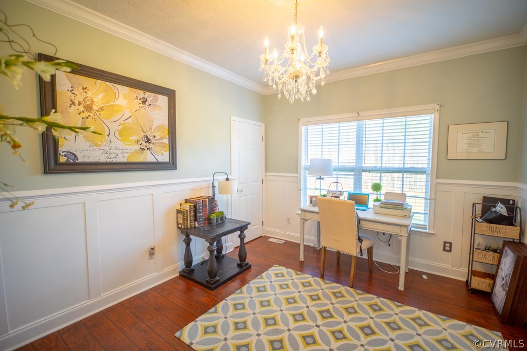 209 Chapel Road Kenbridge, VA 23944 - Photo 26 of 31 a room with chandelier fan and wooden floor
