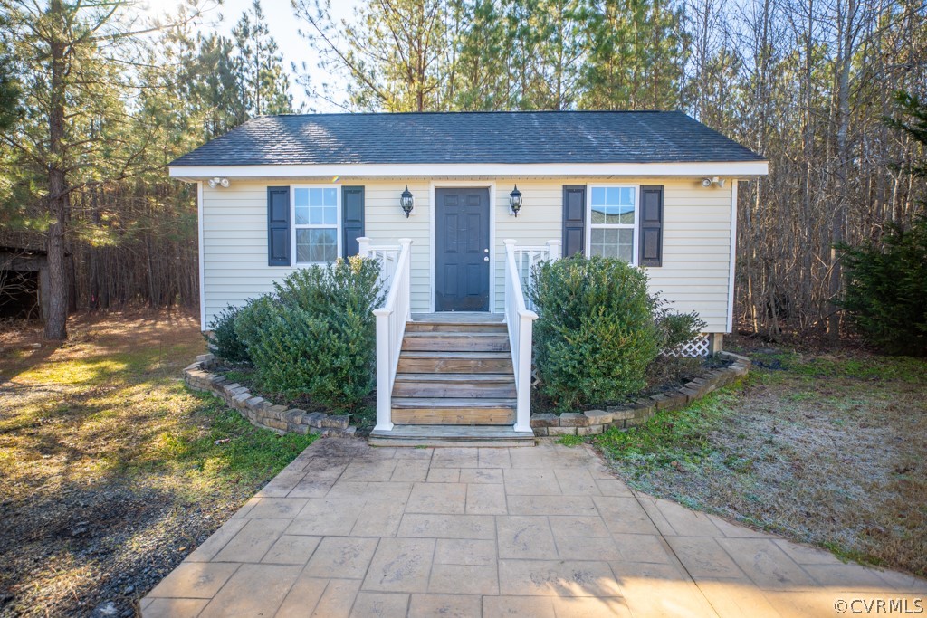 209 Chapel Road Kenbridge, VA 23944 - Photo 6 of 31 a front view of a house with a yard