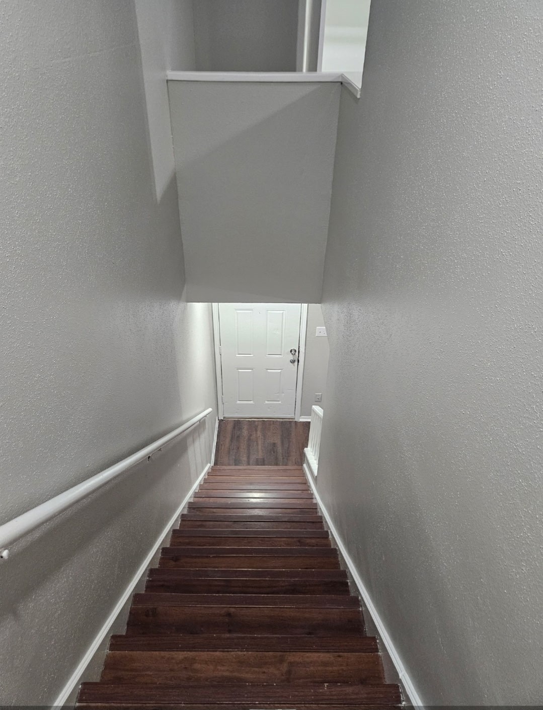 3835 Tanglewilde Street, Unit 3835 Houston, TX 77063 - Photo 6 of 12 Two story town home . Wood laminate floor through out .