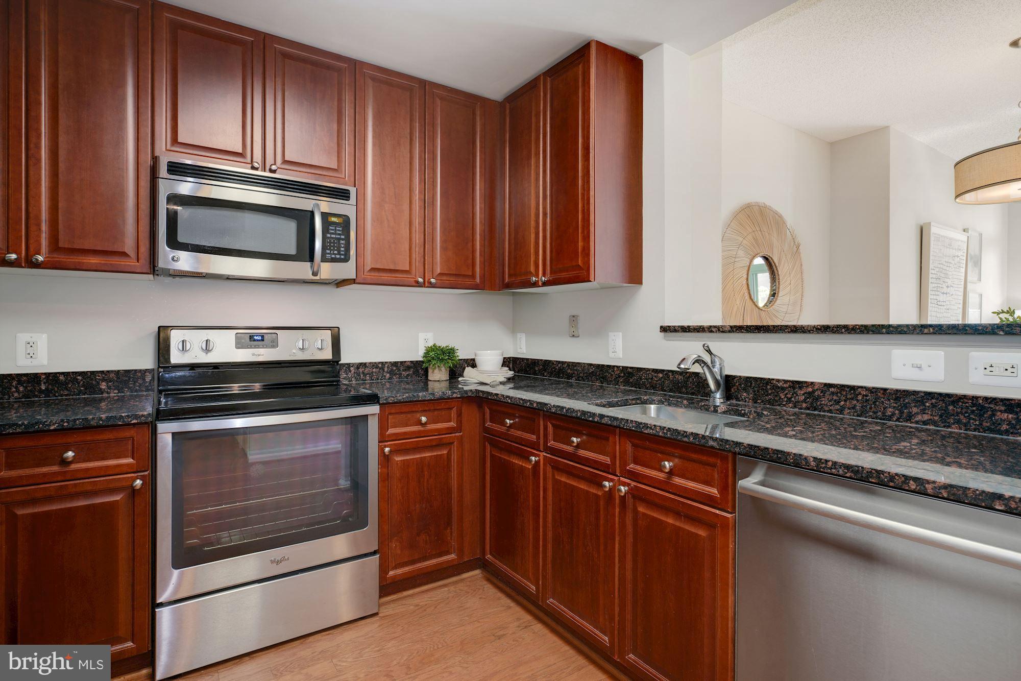 11700 Old Georgetown Road, Unit 406 North Bethesda, MD 20852 - Photo 6 of 29 Kitchen with stainless steel appliances