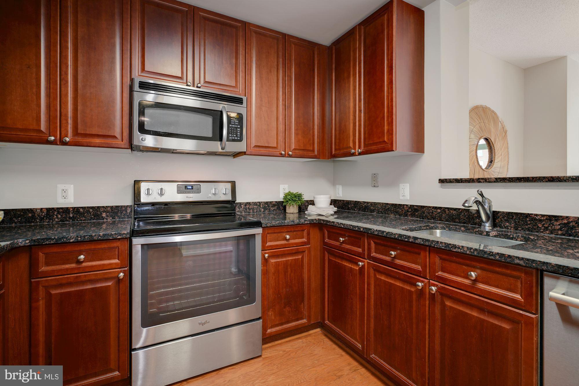 11700 Old Georgetown Road, Unit 406 North Bethesda, MD 20852 - Photo 8 of 29 Another kitchen perspective