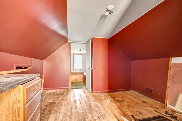 a view of a kitchen with a sink and a stove top oven