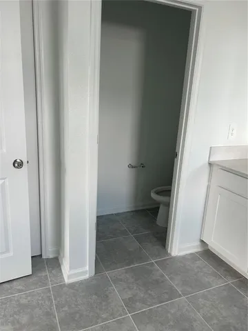 a bathroom with a sink and a toilet