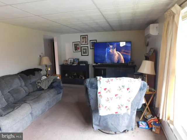 a bathroom with a sink mirror and vanity