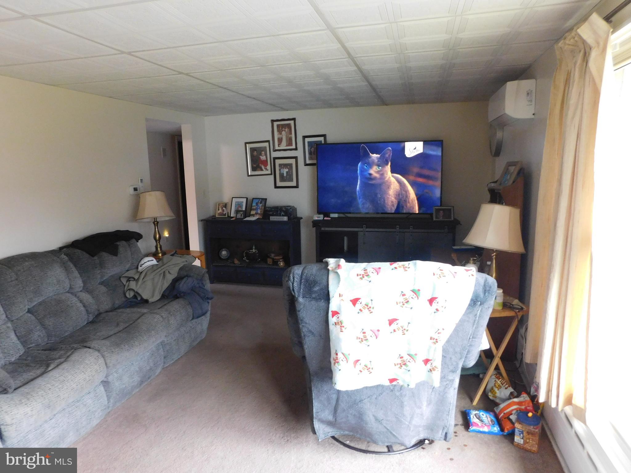 19 Ort Valley Road Lewistown, PA 17044 - Photo 5 of 7 a living room with furniture a couch and a window
